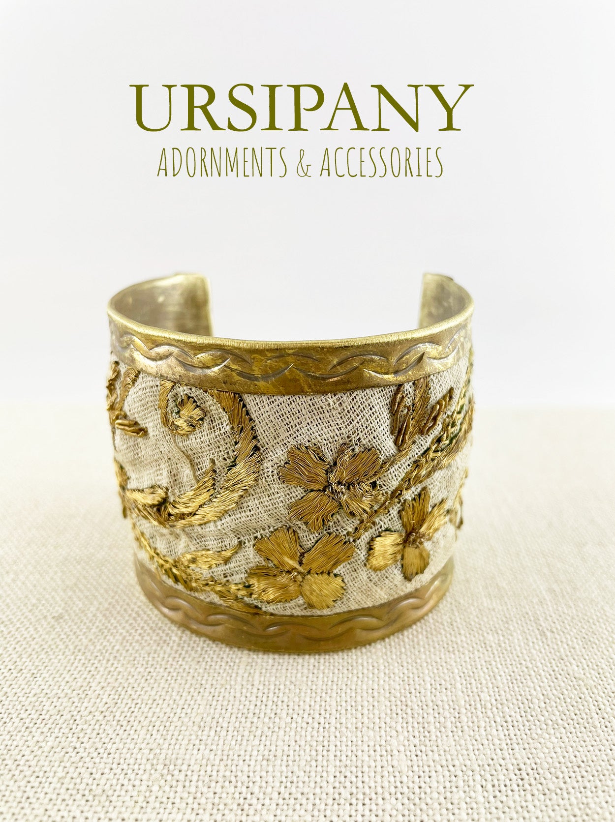 The Brass Cuff Bracelet on off-white Antique Embroidered cotton muslin